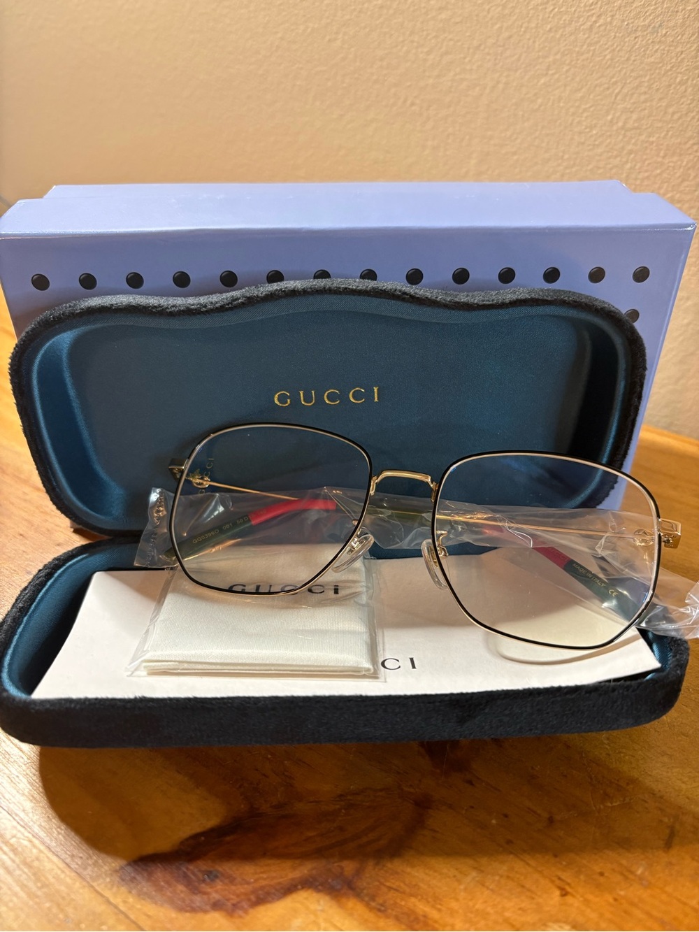Gucci Women's Gold Metal Frame Eyeglasses with Black Accents  03960 001